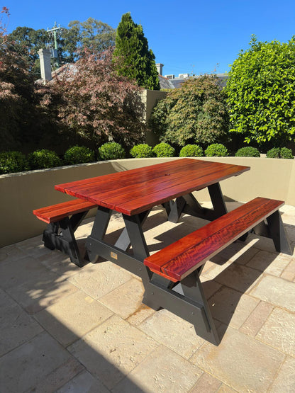 Hardwood picnic table set with black legs designed for school gardens and educational outdoor areas in Australia