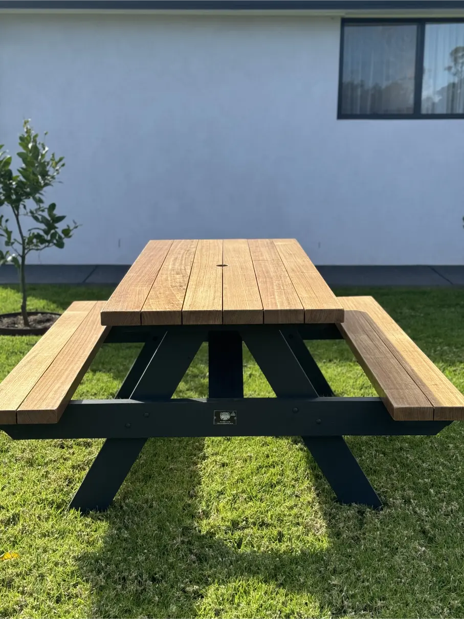 spotted gum hardwood picnic table walnut finish black legs cafe patio Australia