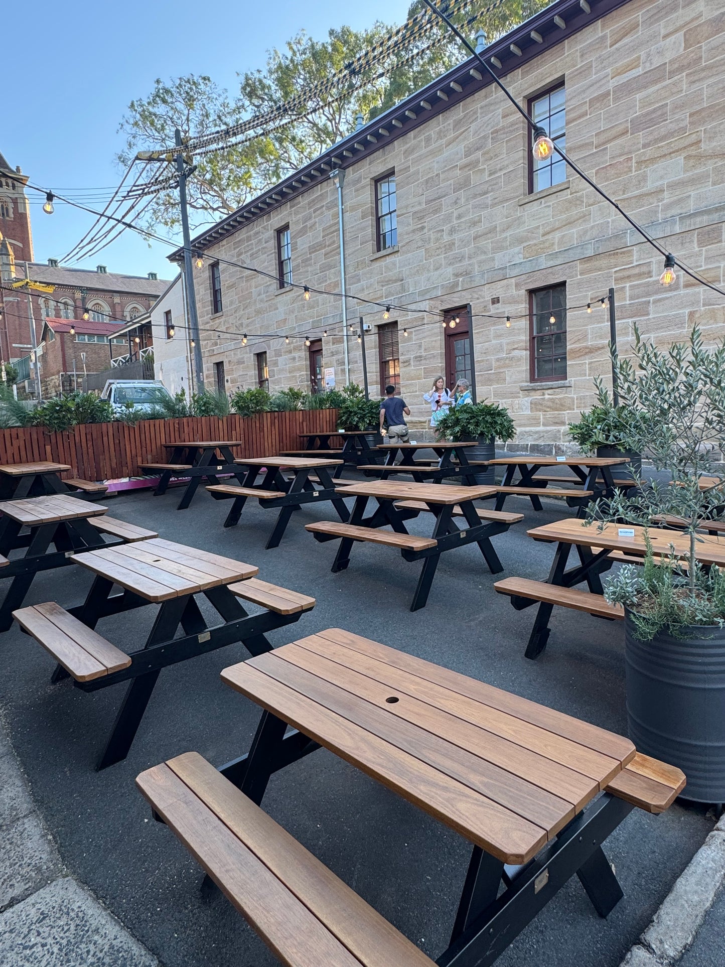 Durable commercial picnic table for event cafés and festival venues, suitable for large outdoor crowds