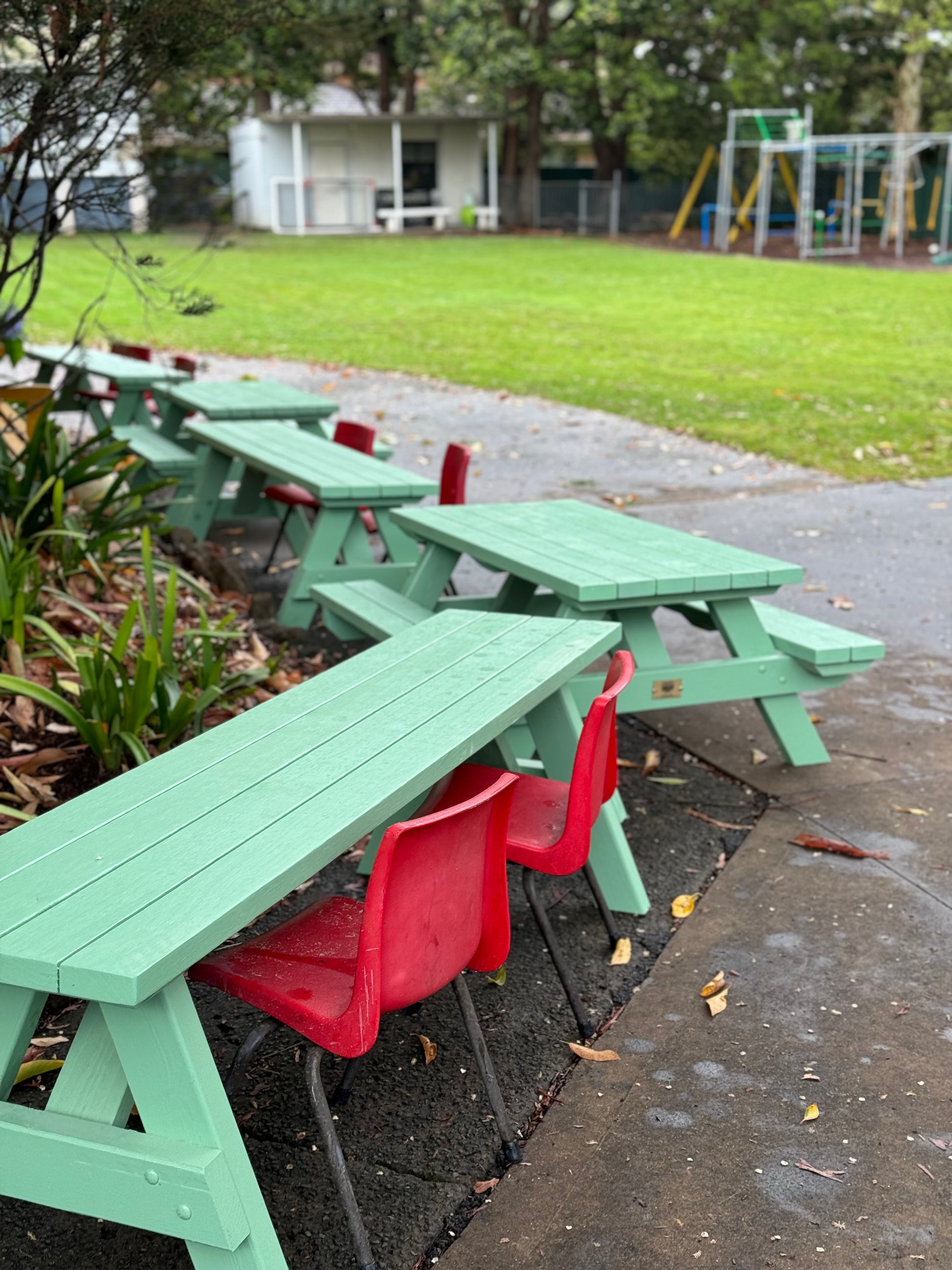 Custom painted green kid-size picnic table without tabletop or seating for backyard and home garden use in Australia