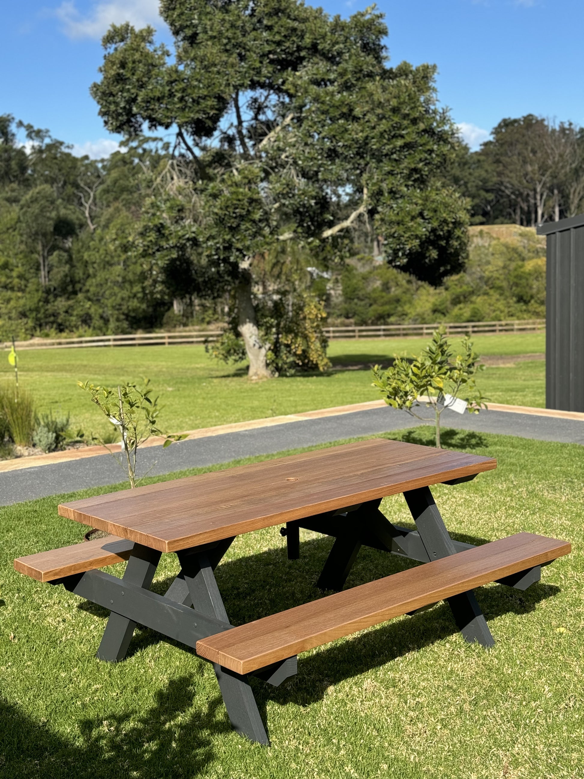 Outdoor picnic table for garden cafés, ideal for leafy outdoor dining spaces and commercial hospitality environments