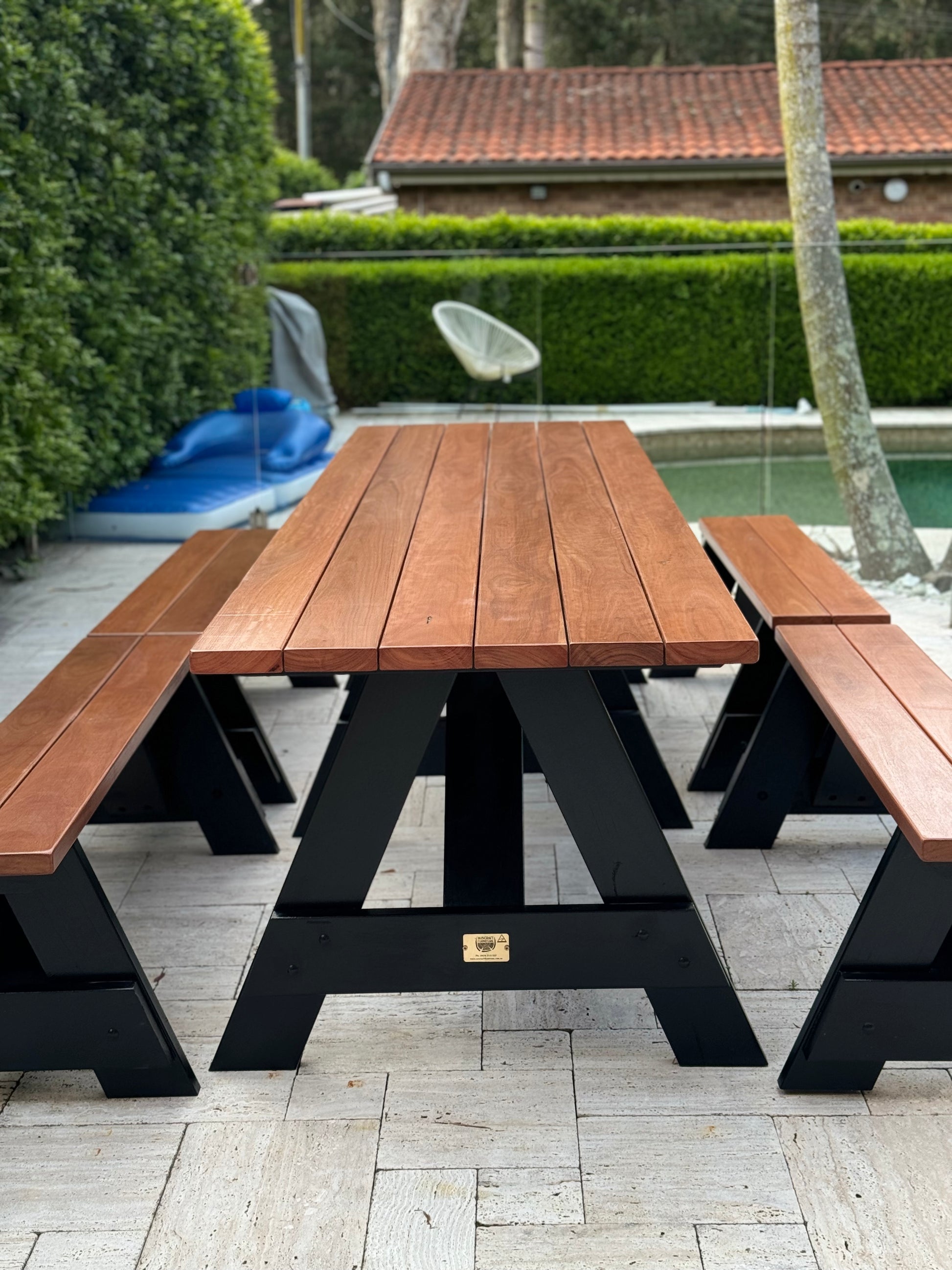 Hardwood picnic table 5-piece garden set with black legs, including four seating units and one outdoor table designed for garden use in Australia