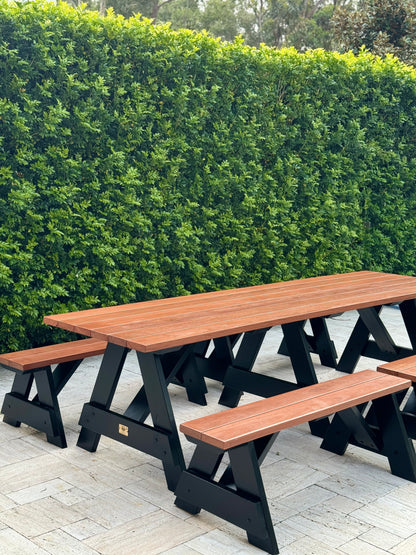 Hardwood picnic table with black legs for shared courtyards in residential and mixed-use property developments in Australia