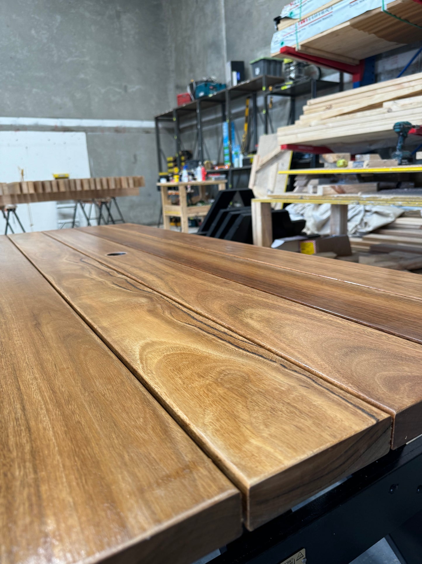Hardwood picnic table production workshop where Australian timber is crafted into strong, long-lasting outdoor furniture for residential and commercial use.