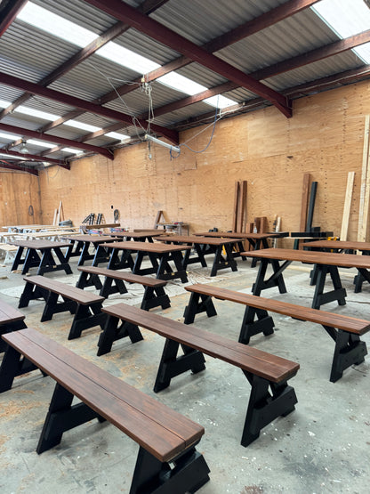 Walnut stain heavy-duty outdoor seating with black legs designed for high-use outdoor environments in Australia