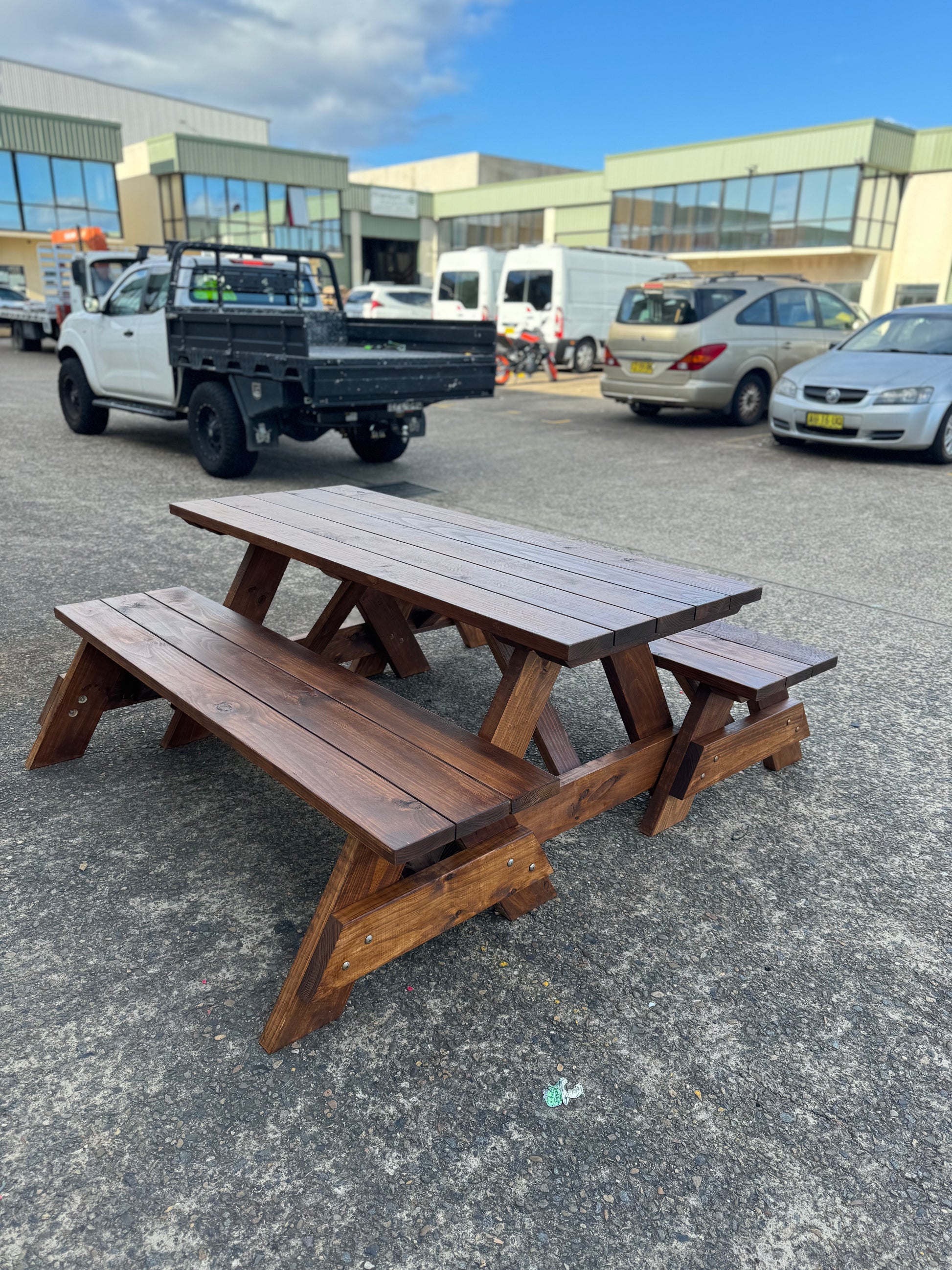 Walnut stain heavy-duty outdoor table suitable for parks and public outdoor gathering spaces in Australia