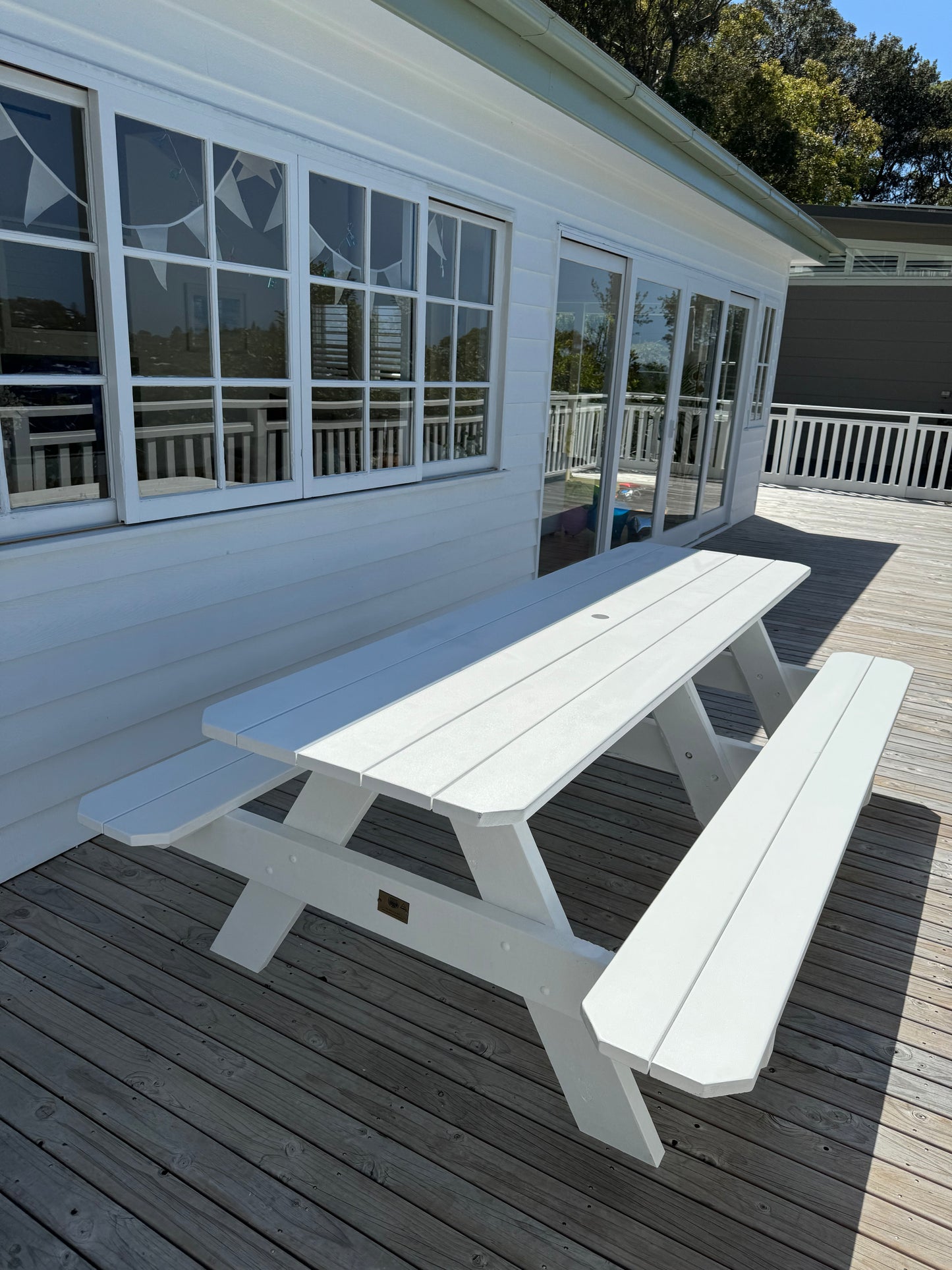 Custom stain heavy duty picnic table with white legs, ideal for restaurant outdoor dining areas needing durable and distinctive seating in Australia