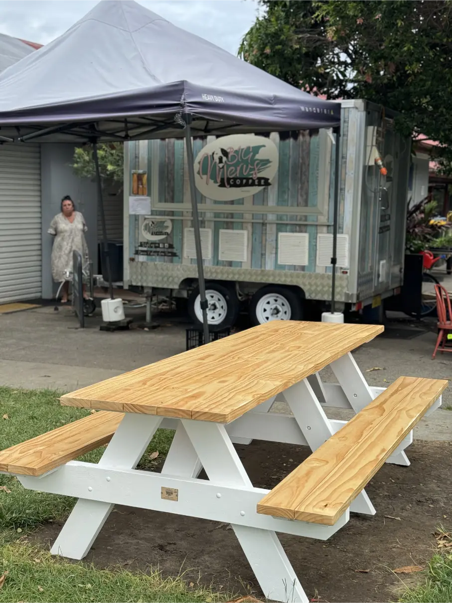 Raw top heavy duty picnic table with white base built for factory yards and staff outdoor break areas in Australia