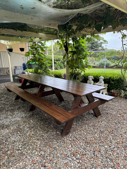 Walnut timber picnic table perfect for holiday parks and shared guest outdoor dining areas in Australia