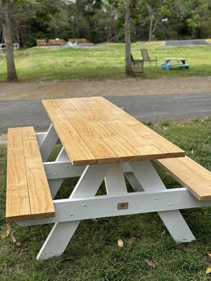 Durable heavy duty picnic table with white legs and raw top for public park seating in Australia