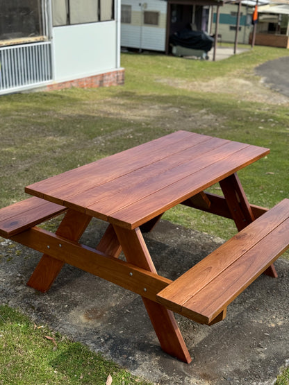 “Auscraft outdoor hardwood picnic table featuring a dark walnut timber look, perfect for Sydney parks, restaurants and home garden areas.