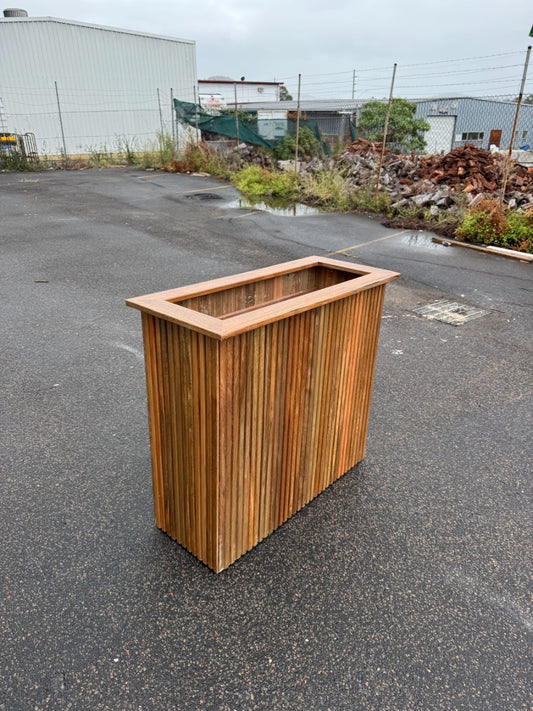 Premium handcrafted planter box made in Brisbane, durable and stylish, suitable for outdoor use in gardens, parks, cafes, and commercial spaces.
