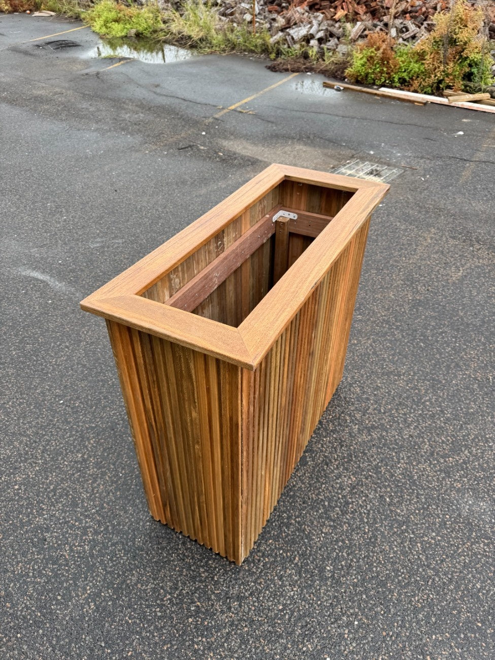 Premium handcrafted planter box made in Queensland, durable and stylish, suitable for outdoor use in gardens, parks, cafes, and commercial spaces.
