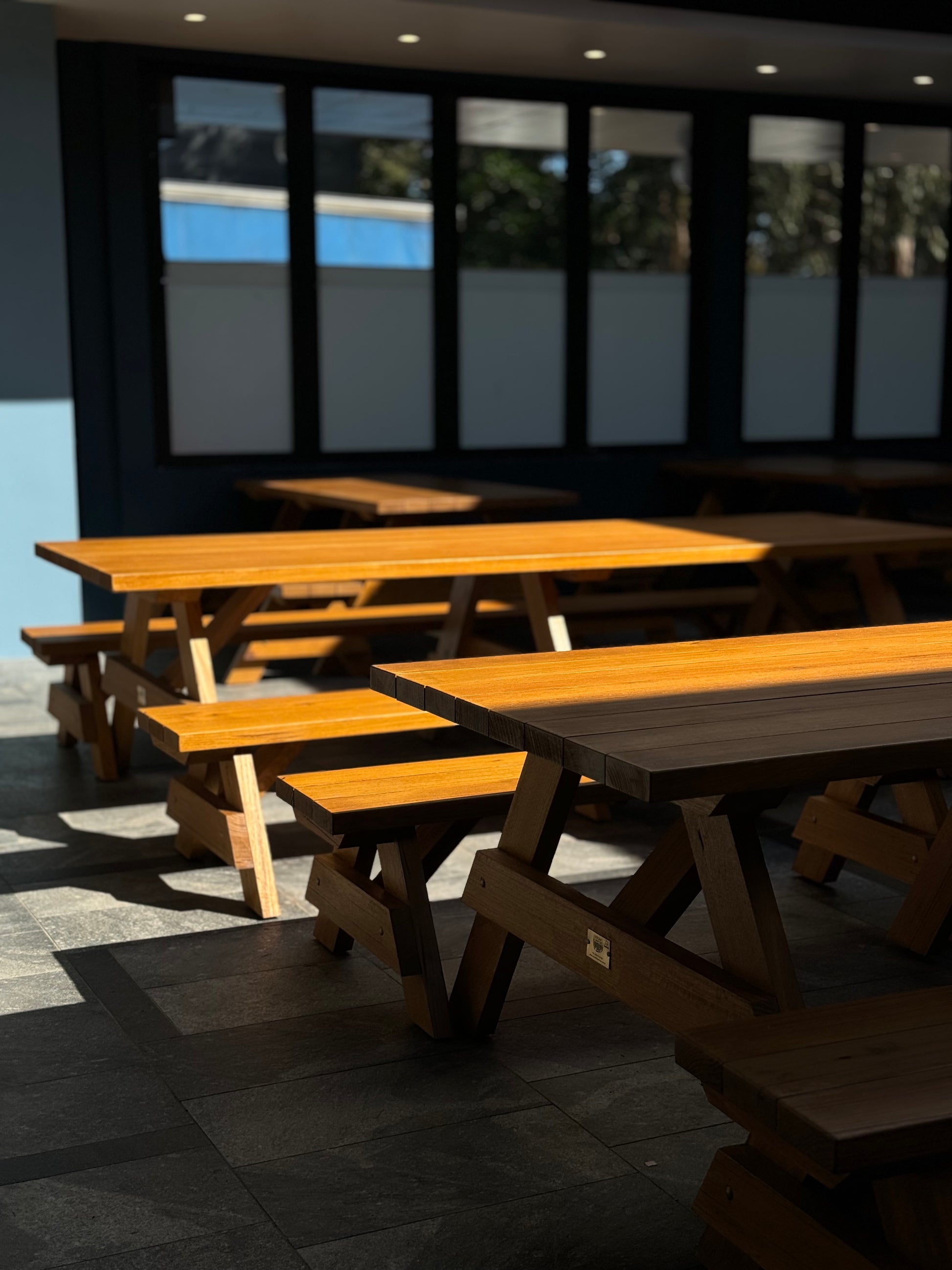 Premium oiled walnut hardwood picnic table designed for high-end residential gardens in Australia