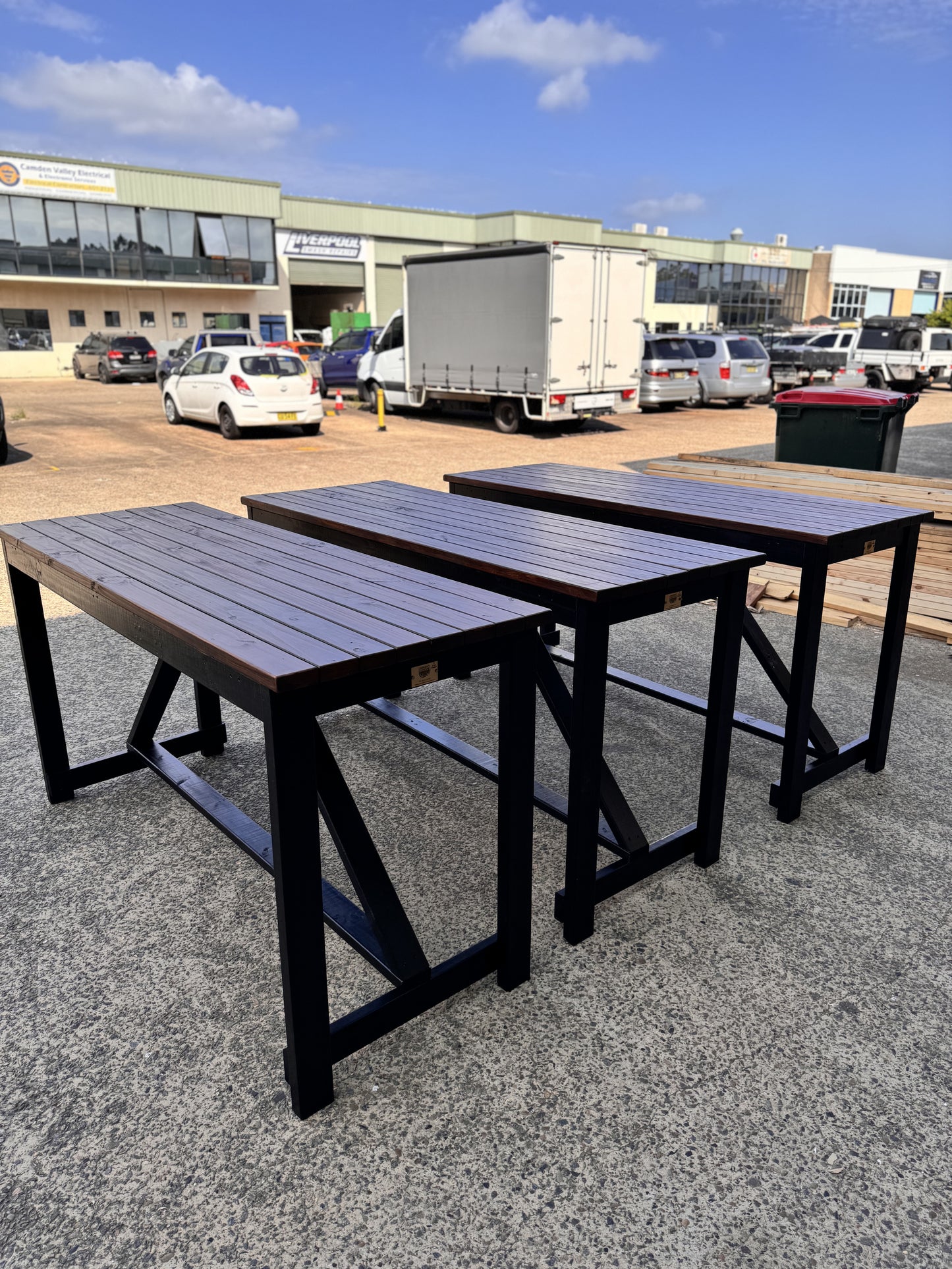 Black solid wood high bar table suitable for contemporary indoor and outdoor settings in Australia