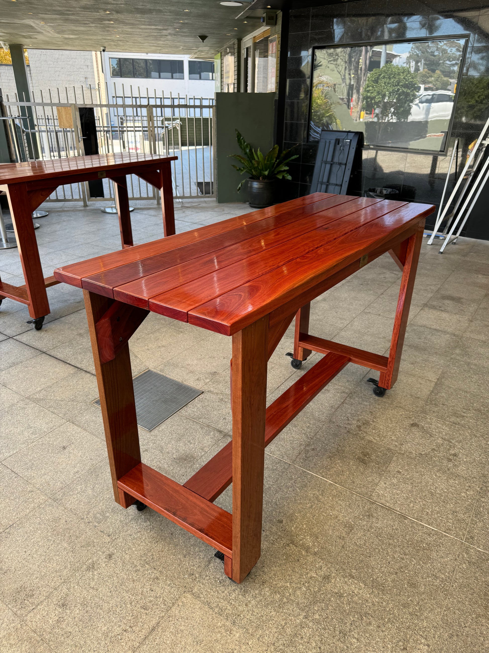 Durable full varnished high bar table for beachside cafés and outdoor seating areas