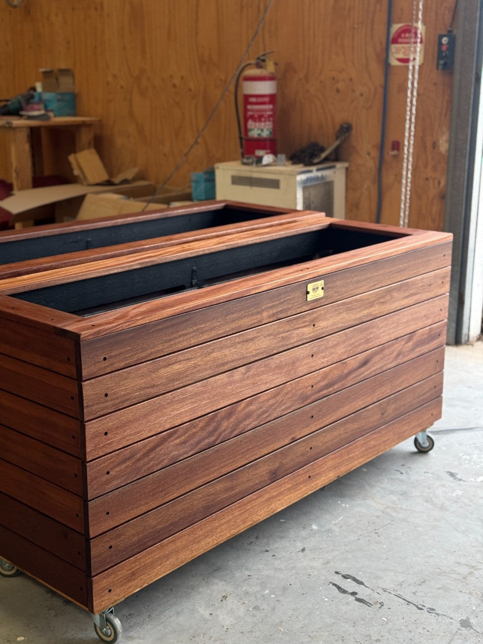 Traditional handcrafted planter box in kiln-dried Jambu hardwood, ideal for balconies, terraces, and small outdoor residential spaces.