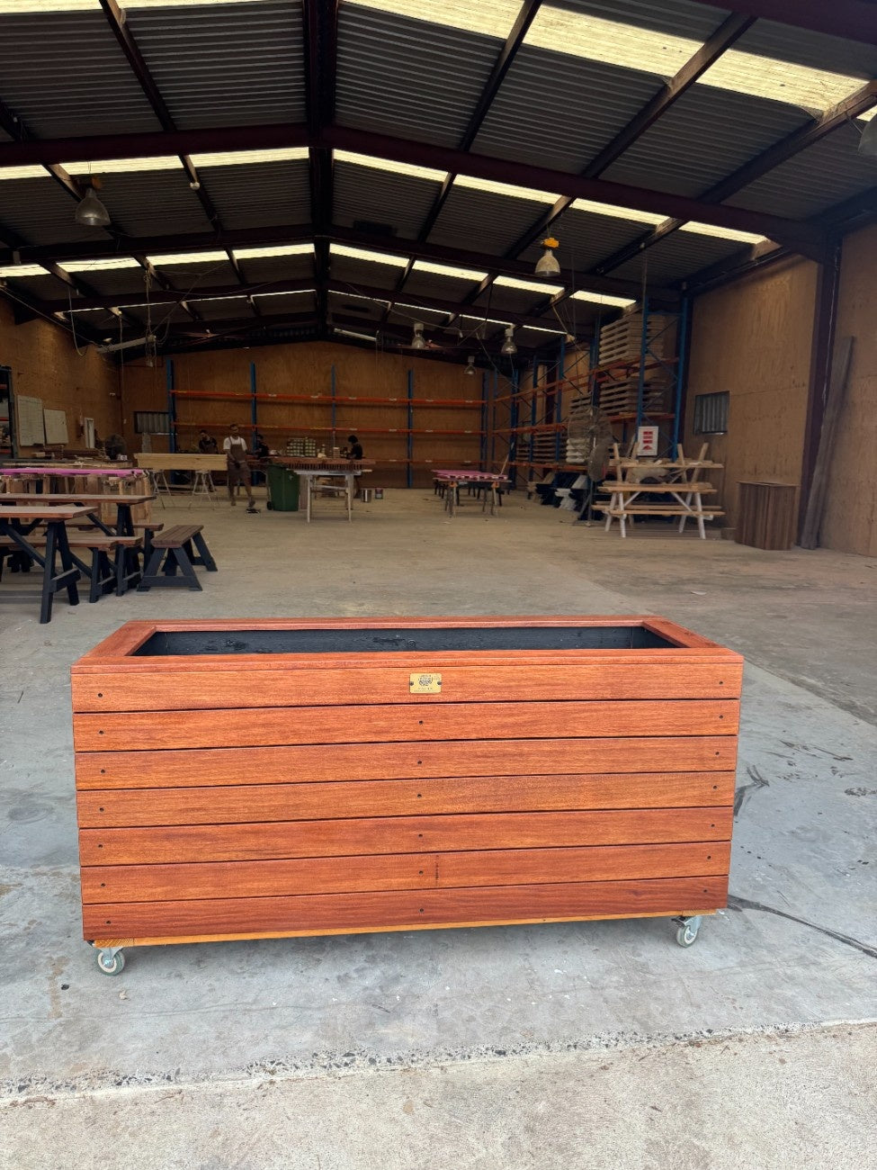 Durable traditional planter box crafted from kiln-dried Jambu hardwood, suitable for botanic gardens and landscaped public green spaces.
