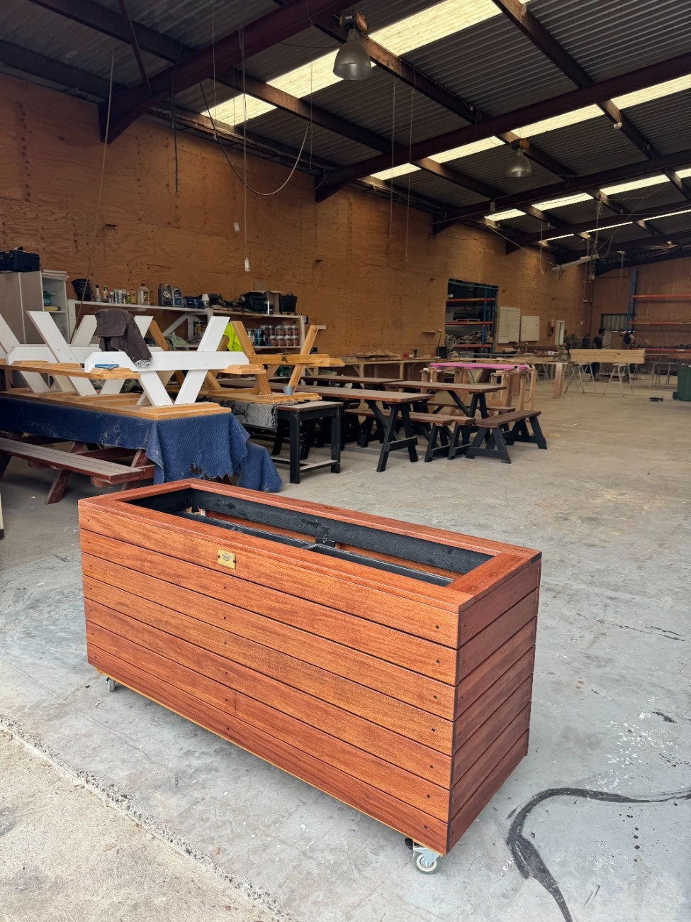 Premium traditional planter box made from kiln-dried Jambu hardwood, ideal for exhibition halls, trade shows, and indoor events.