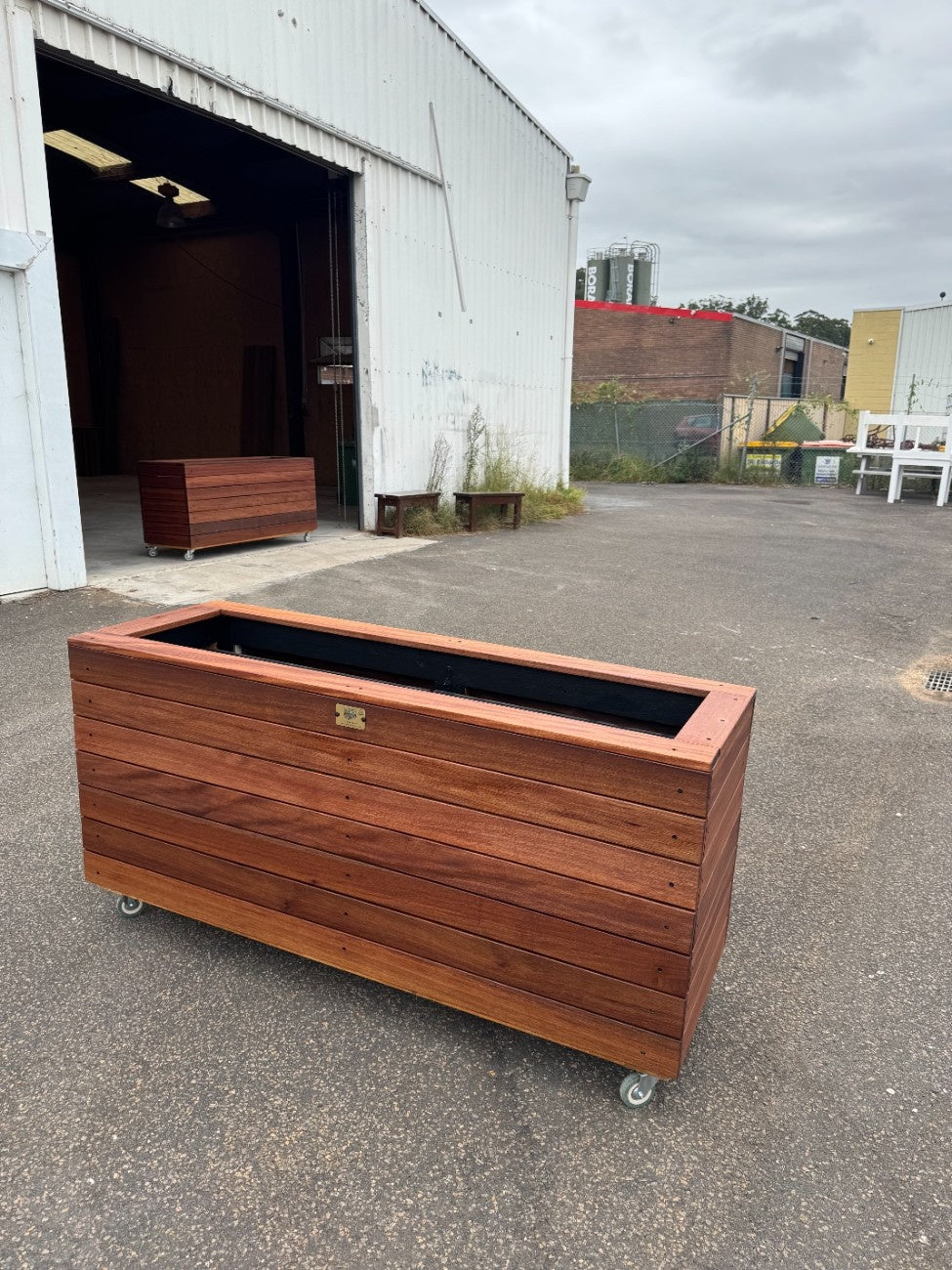 Traditional planter box made from kiln-dried Jambu hardwood, stylish and durable, perfect for residential gardens, courtyards, and balconies.
