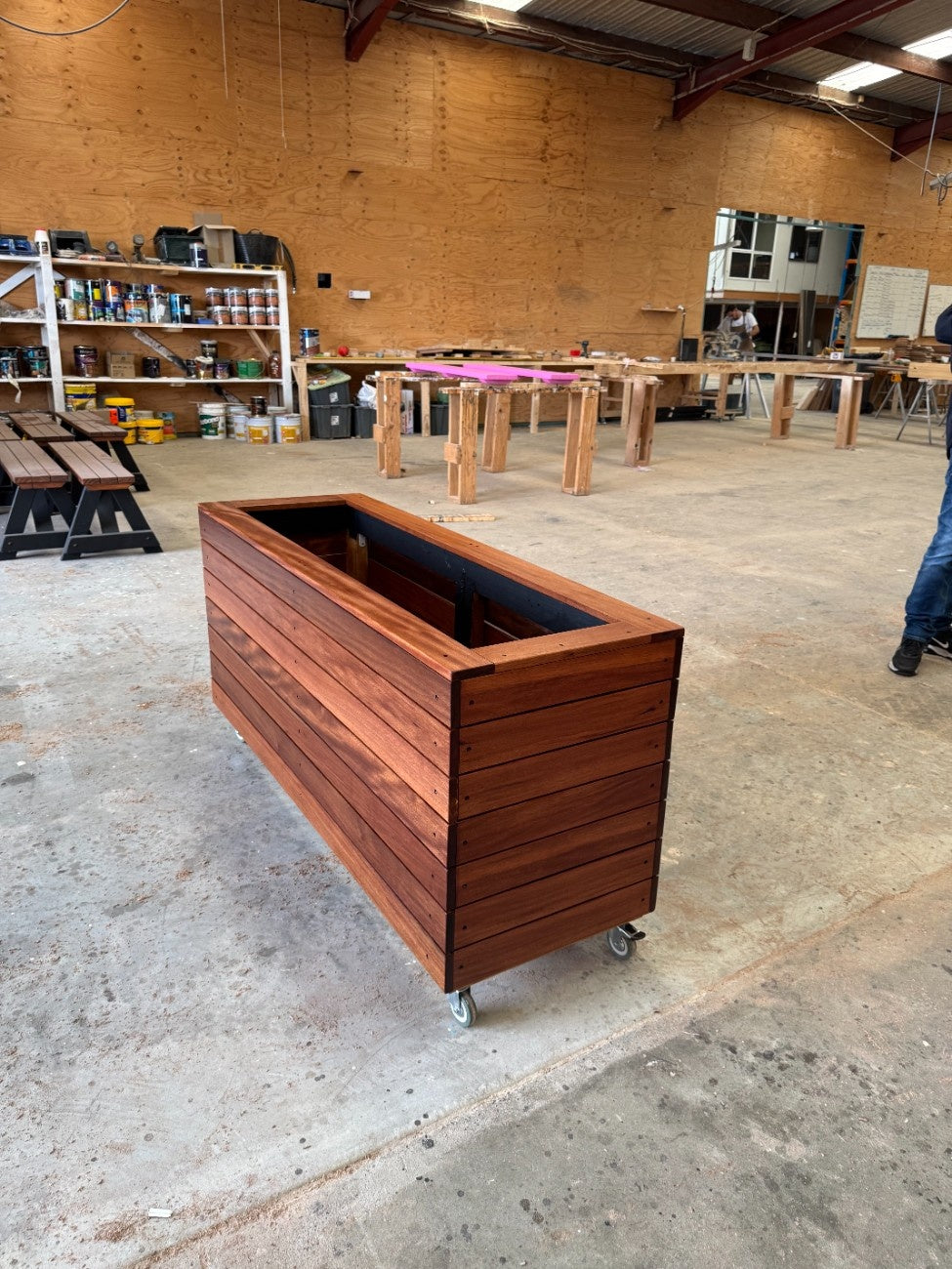 Premium handcrafted planter box in kiln-dried Jambu hardwood, strong and weather-resistant, ideal for hospitals, aged-care, and healthcare facilities.