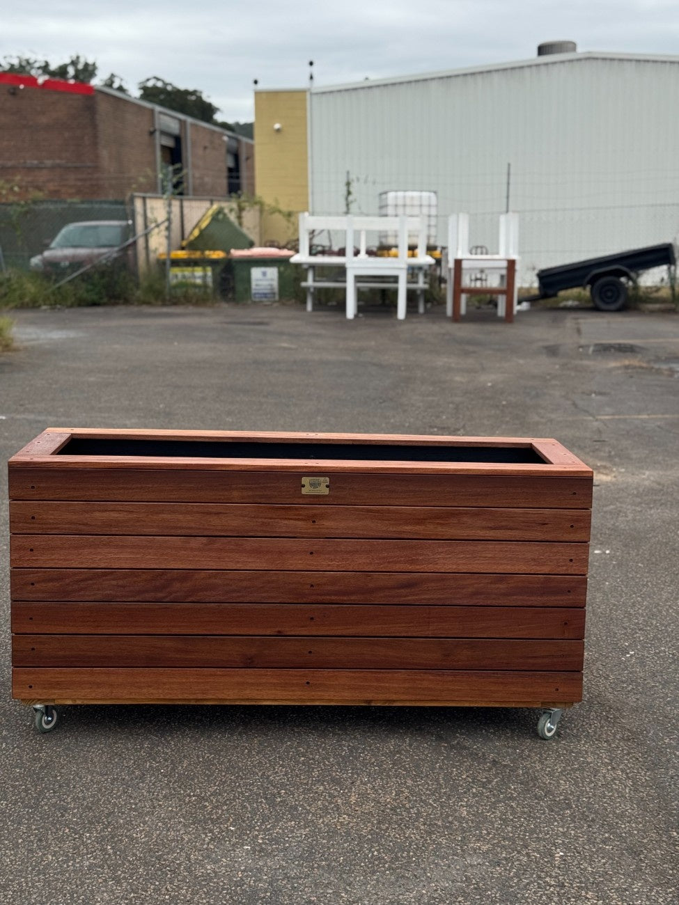 Handcrafted traditional planter box in kiln-dried Jambu hardwood, ideal for hotels, resorts, and hospitality venues seeking natural statement pieces.