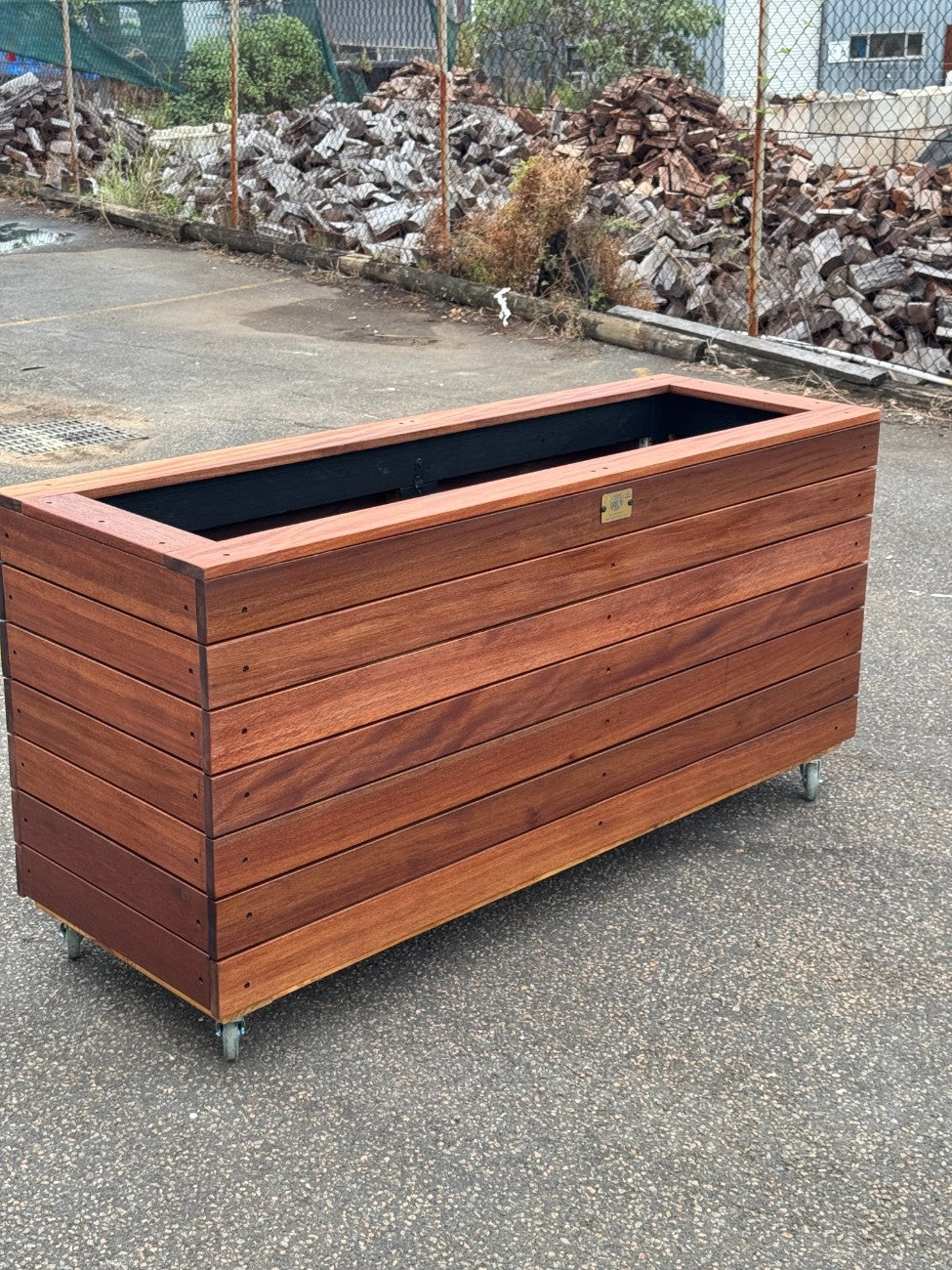 Premium traditional planter box made from kiln-dried Jambu hardwood, durable and elegant, suitable for resorts and hospitality outdoor areas.