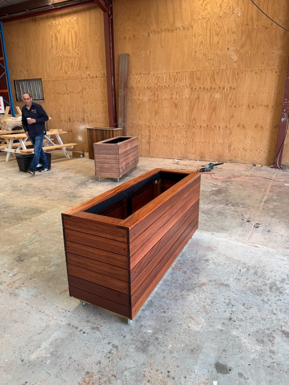 Premium traditional planter box made from kiln-dried Jambu hardwood, durable and elegant, suitable for shopping malls, atriums, and retail spaces.