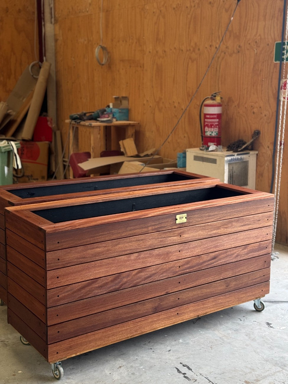 Premium traditional handcrafted planter box with raw wood finish, made in Sydney, durable and stylish, suitable for outdoor use in gardens, parks, cafes, and commercial spaces.
