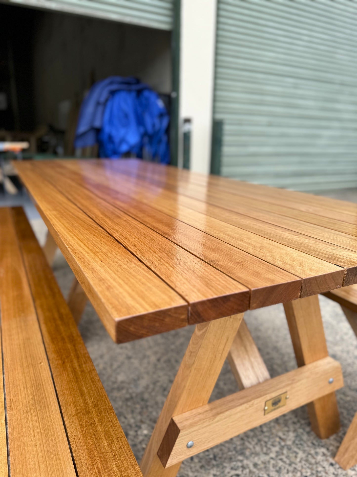 Oiled walnut hardwood picnic table designed for holiday homes and private outdoor retreat spaces in Australia