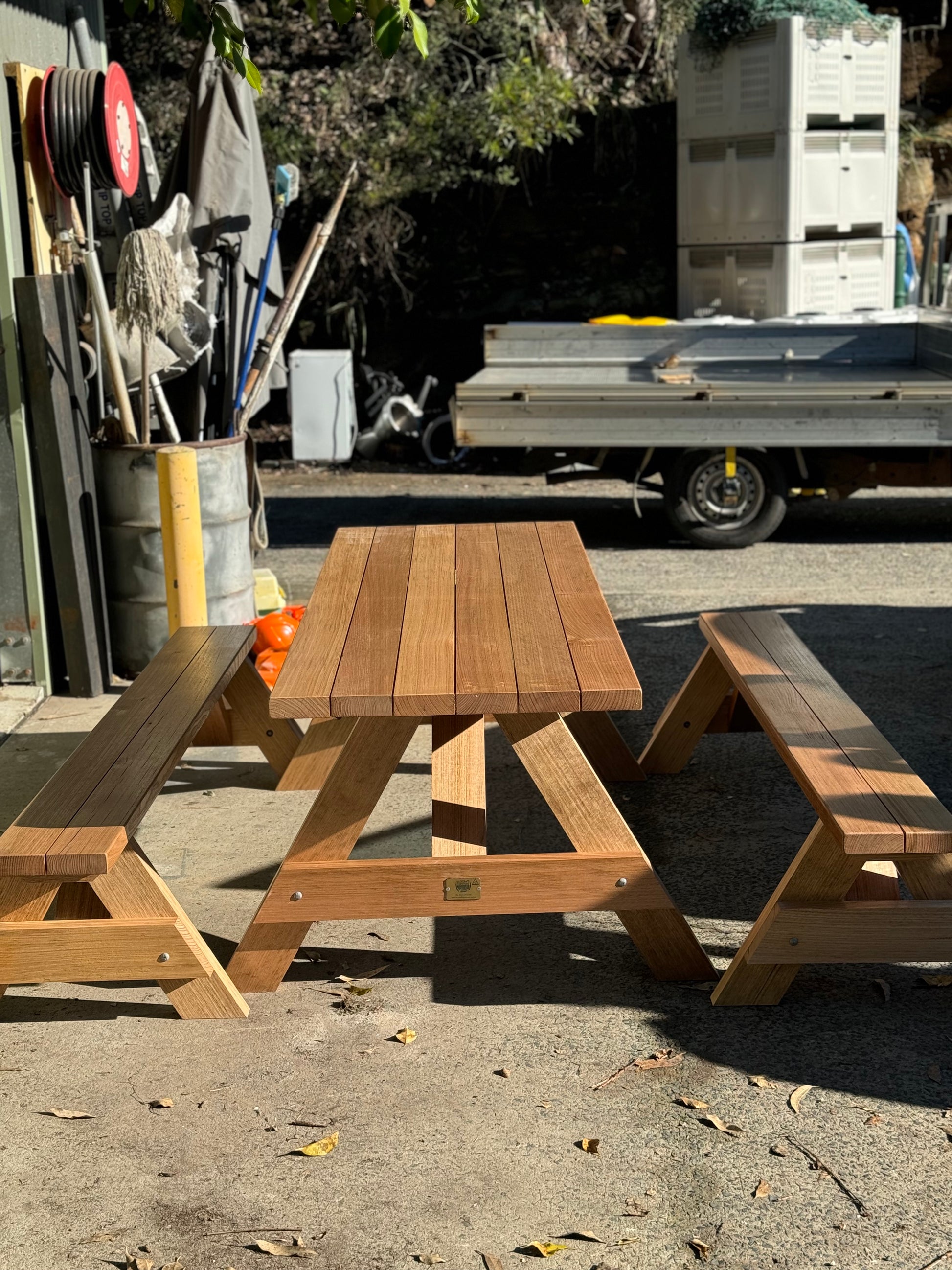 Varnished walnut hardwood picnic table with a protective finish designed for outdoor durability in Australia